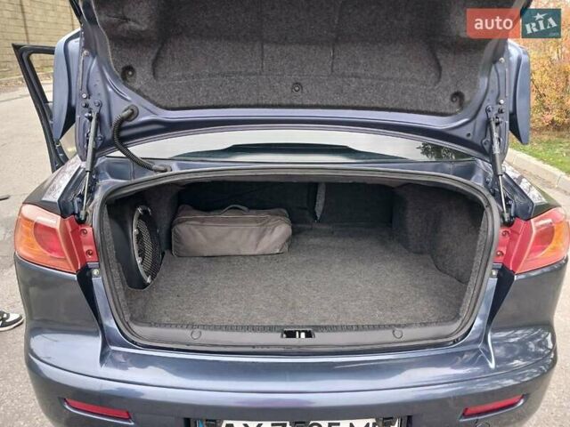 Синий Мицубиси Лансер, объемом двигателя 1.5 л и пробегом 220 тыс. км за 6999 $, фото 13 на Automoto.ua