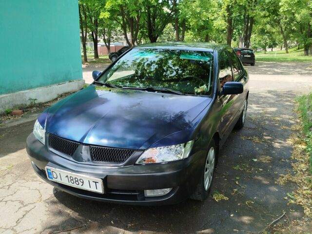 Мицубиси Лансер 2008 в Белой Церкве на Automoto.ua Синий Мицубиси Лансер, объемом двигателя 1.6 л и пробегом 243 тыс. км за 4200 $, фото 4 на Automoto.ua