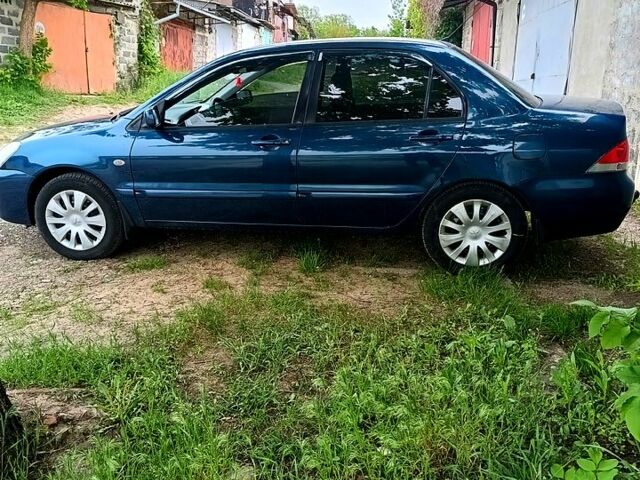 Міцубісі Lancer 2008 у Харкові на Automoto.ua Синій Міцубісі Lancer, об'ємом двигуна 1.6 л та пробігом 210 тис. км за 3700 $, фото 3 на Automoto.ua