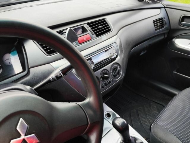 Мицубиси Лансер 2008 в Белой Церкве на Automoto.ua Синий Мицубиси Лансер, объемом двигателя 1.6 л и пробегом 243 тыс. км за 4200 $, фото 10 на Automoto.ua