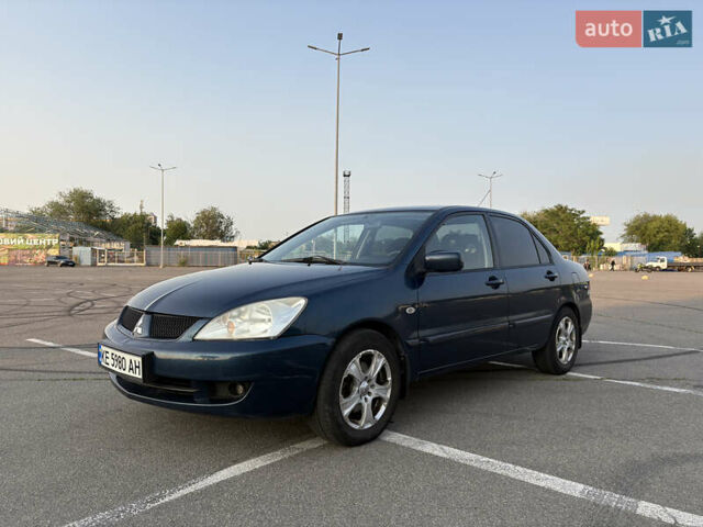 Синій Міцубісі Lancer, об'ємом двигуна 1.58 л та пробігом 167 тис. км за 5700 $, фото 2 на Automoto.ua