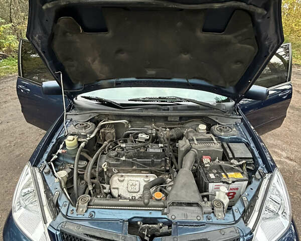 Синий Мицубиси Лансер, объемом двигателя 1.6 л и пробегом 150 тыс. км за 5700 $, фото 20 на Automoto.ua