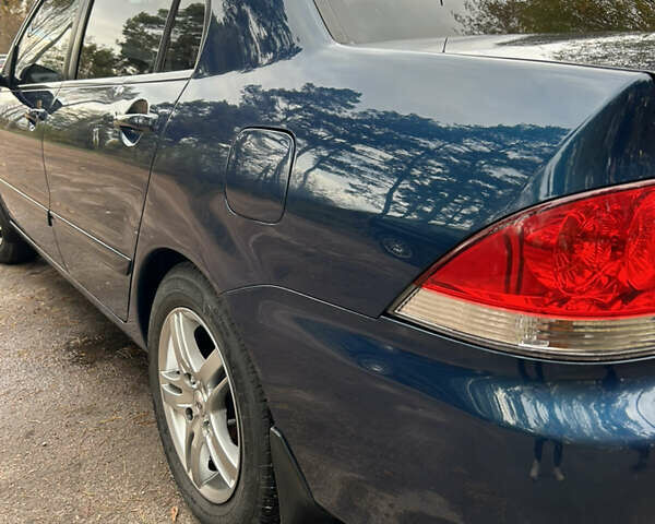 Синий Мицубиси Лансер, объемом двигателя 1.6 л и пробегом 150 тыс. км за 5700 $, фото 52 на Automoto.ua