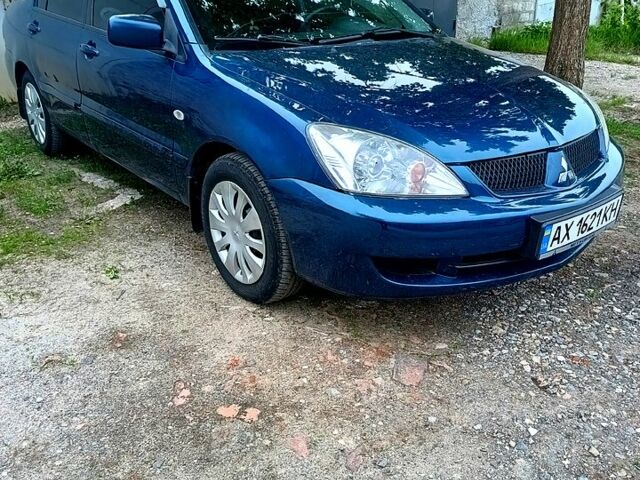Міцубісі Lancer 2008 у Харкові на Automoto.ua Синій Міцубісі Lancer, об'ємом двигуна 1.6 л та пробігом 210 тис. км за 3700 $, фото 2 на Automoto.ua