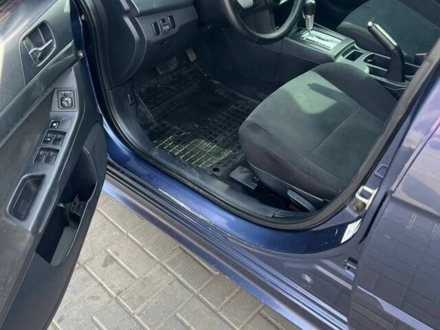 Синій Міцубісі Lancer, об'ємом двигуна 1.5 л та пробігом 213 тис. км за 5350 $, фото 4 на Automoto.ua