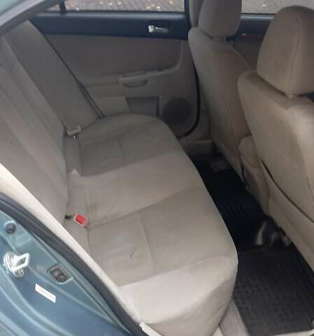 Синий Мицубиси Лансер, объемом двигателя 2 л и пробегом 300 тыс. км за 6900 $, фото 8 на Automoto.ua