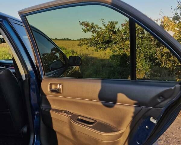 Синий Мицубиси Лансер, объемом двигателя 1.6 л и пробегом 197 тыс. км за 6500 $, фото 16 на Automoto.ua