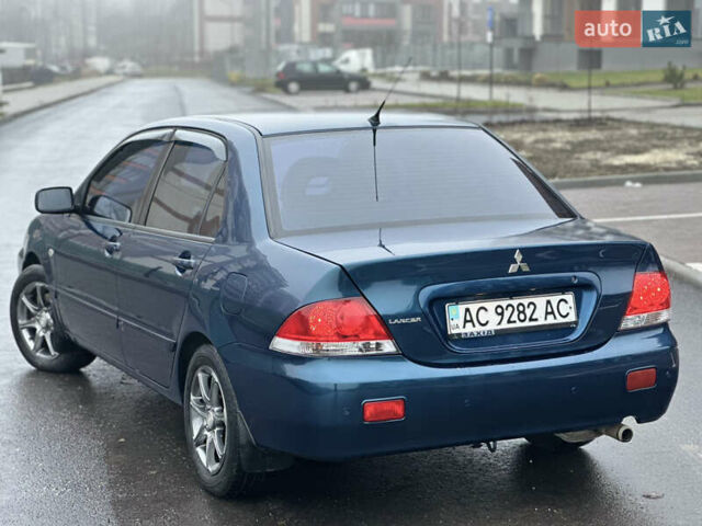Синий Мицубиси Лансер, объемом двигателя 1.6 л и пробегом 187 тыс. км за 3799 $, фото 12 на Automoto.ua