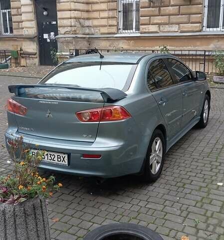 Синий Мицубиси Лансер, объемом двигателя 2 л и пробегом 300 тыс. км за 6900 $, фото 7 на Automoto.ua