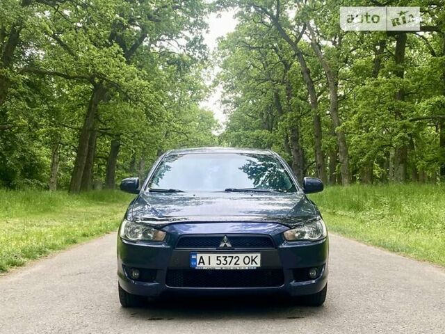 Синій Міцубісі Lancer, об'ємом двигуна 2 л та пробігом 130 тис. км за 7800 $, фото 5 на Automoto.ua