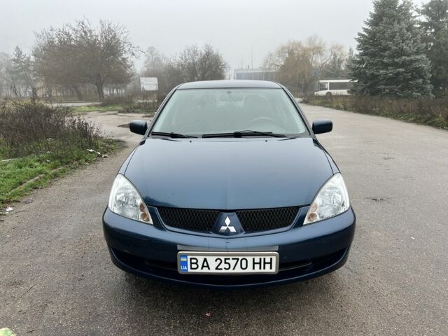 Синій Міцубісі Lancer, об'ємом двигуна 1.6 л та пробігом 126 тис. км за 5950 $, фото 1 на Automoto.ua