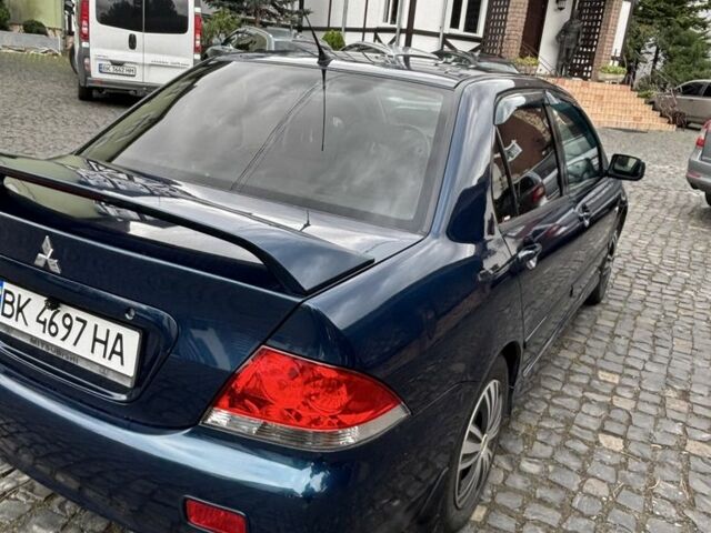 Міцубісі Lancer 2008 у Рівному на Automoto.ua Синій Міцубісі Lancer, об'ємом двигуна 1.6 л та пробігом 158 тис. км за 3900 $, фото 5 на Automoto.ua