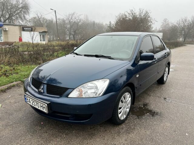 Синій Міцубісі Lancer, об'ємом двигуна 1.6 л та пробігом 126 тис. км за 5950 $, фото 2 на Automoto.ua