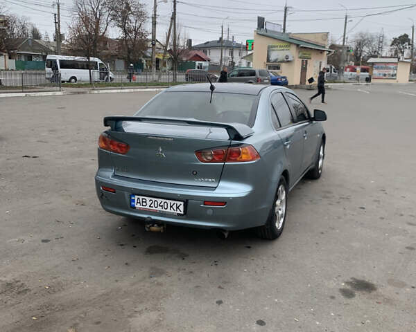 Синій Міцубісі Lancer, об'ємом двигуна 1.5 л та пробігом 250 тис. км за 4700 $, фото 11 на Automoto.ua