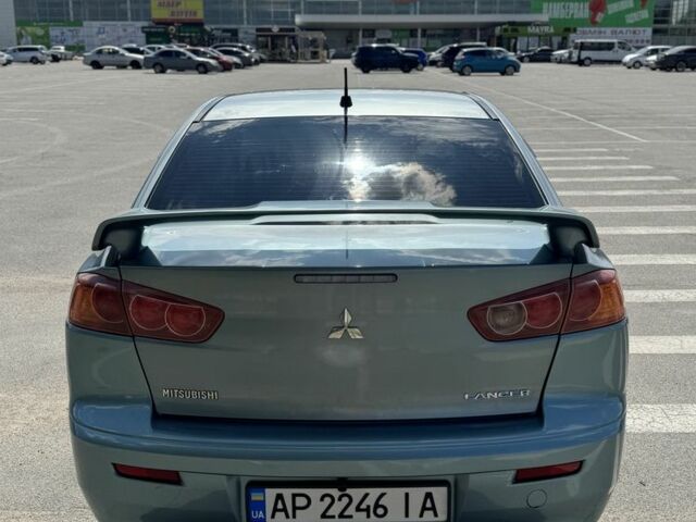 Синий Мицубиси Лансер, объемом двигателя 2 л и пробегом 278 тыс. км за 5750 $, фото 3 на Automoto.ua