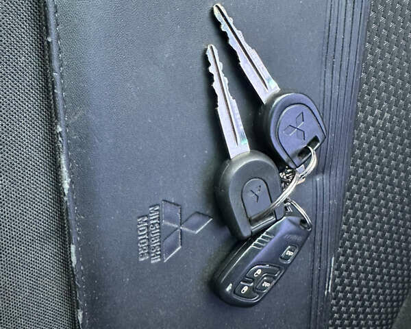 Синий Мицубиси Лансер, объемом двигателя 1.6 л и пробегом 187 тыс. км за 3799 $, фото 22 на Automoto.ua