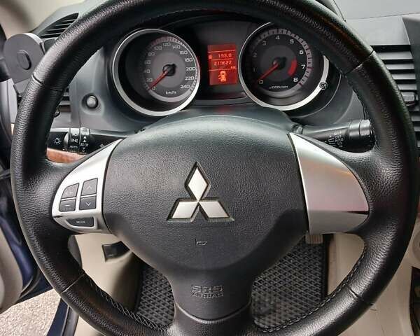 Синий Мицубиси Лансер, объемом двигателя 1.5 л и пробегом 220 тыс. км за 6999 $, фото 16 на Automoto.ua