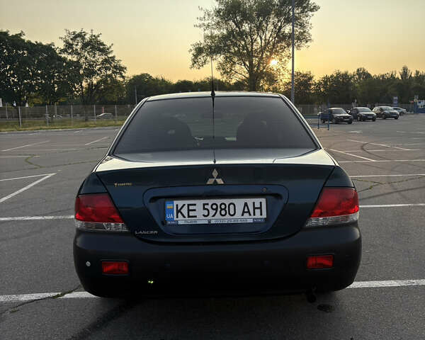 Синій Міцубісі Lancer, об'ємом двигуна 1.58 л та пробігом 167 тис. км за 5700 $, фото 5 на Automoto.ua