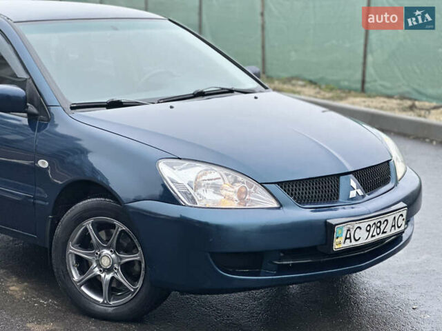 Синий Мицубиси Лансер, объемом двигателя 1.6 л и пробегом 187 тыс. км за 3799 $, фото 10 на Automoto.ua