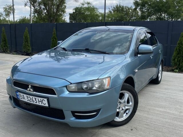 Синий Мицубиси Лансер, объемом двигателя 1.5 л и пробегом 261 тыс. км за 5500 $, фото 6 на Automoto.ua