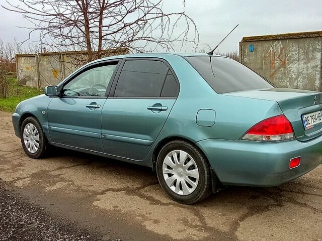 Синій Міцубісі Lancer, об'ємом двигуна 1.6 л та пробігом 167 тис. км за 4700 $, фото 3 на Automoto.ua