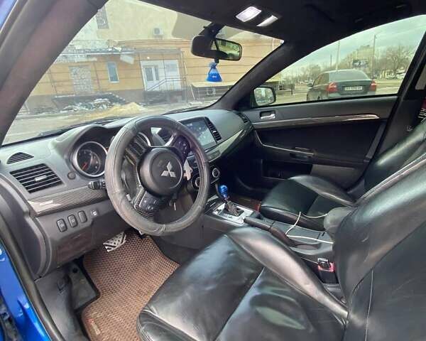Мицубиси Лансер 2008 в Харькове на Automoto.ua Синий Мицубиси Лансер, объемом двигателя 2 л и пробегом 215 тыс. км за 10500 $, фото 6 на Automoto.ua