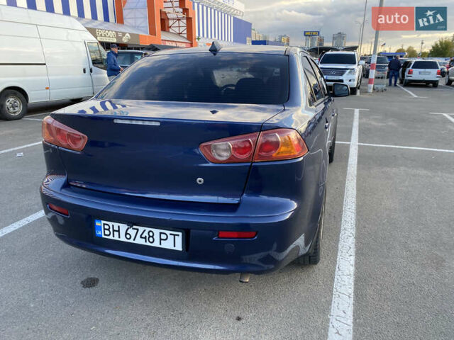 Синий Мицубиси Лансер, объемом двигателя 1.5 л и пробегом 247 тыс. км за 4500 $, фото 3 на Automoto.ua
