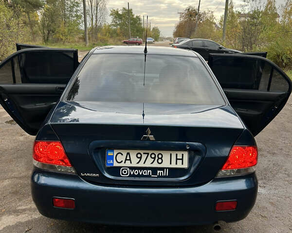 Синий Мицубиси Лансер, объемом двигателя 1.6 л и пробегом 150 тыс. км за 5700 $, фото 34 на Automoto.ua