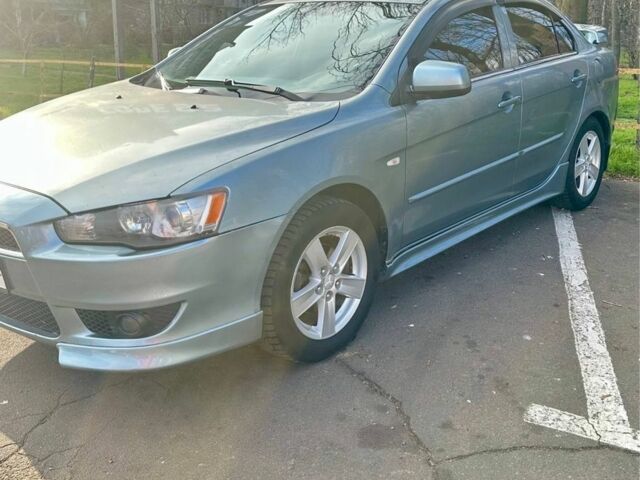 Синий Мицубиси Лансер, объемом двигателя 1.5 л и пробегом 250 тыс. км за 5150 $, фото 4 на Automoto.ua