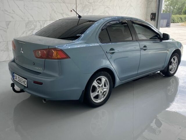 Синий Мицубиси Лансер, объемом двигателя 1.5 л и пробегом 261 тыс. км за 5500 $, фото 5 на Automoto.ua