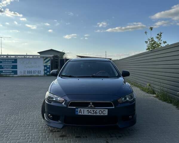 Синий Мицубиси Лансер, объемом двигателя 1.97 л и пробегом 260 тыс. км за 6000 $, фото 1 на Automoto.ua