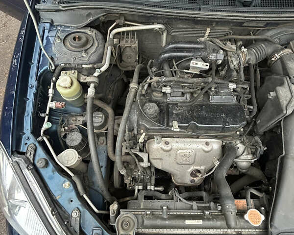 Синий Мицубиси Лансер, объемом двигателя 1.6 л и пробегом 150 тыс. км за 5700 $, фото 19 на Automoto.ua