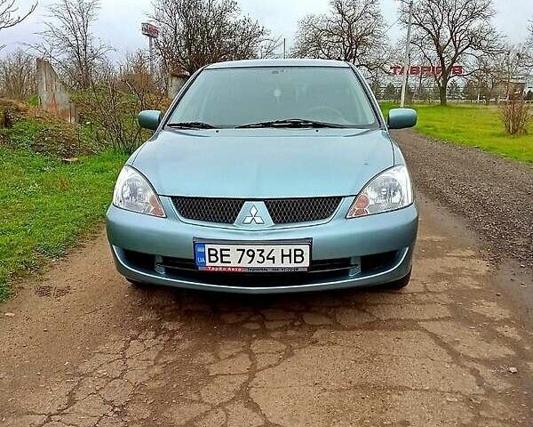 Синий Мицубиси Лансер, объемом двигателя 1.6 л и пробегом 167 тыс. км за 4700 $, фото 13 на Automoto.ua