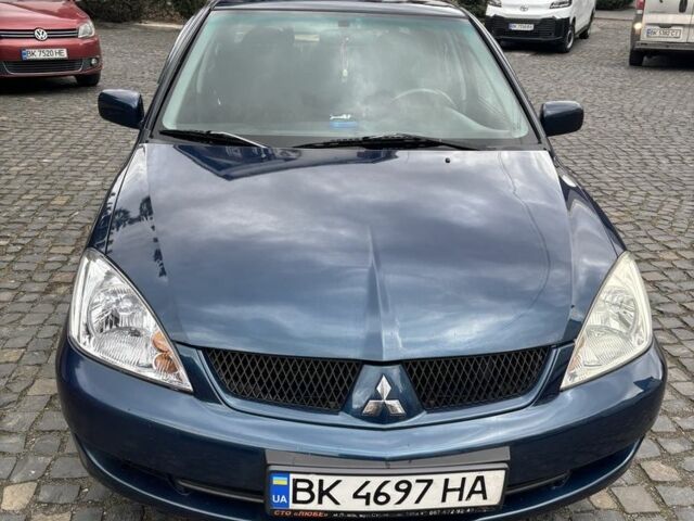 Міцубісі Lancer 2008 у Рівному на Automoto.ua Синій Міцубісі Lancer, об'ємом двигуна 1.6 л та пробігом 158 тис. км за 3900 $, фото 20 на Automoto.ua