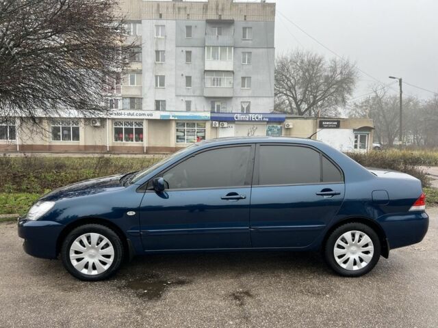 Синій Міцубісі Lancer, об'ємом двигуна 1.6 л та пробігом 126 тис. км за 5950 $, фото 3 на Automoto.ua