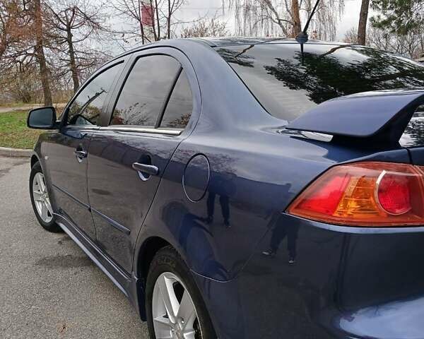 Синий Мицубиси Лансер, объемом двигателя 1.5 л и пробегом 220 тыс. км за 6999 $, фото 29 на Automoto.ua