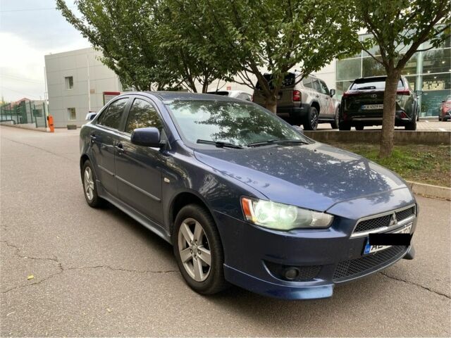 Синій Міцубісі Lancer, об'ємом двигуна 1.5 л та пробігом 212 тис. км за 5555 $, фото 4 на Automoto.ua