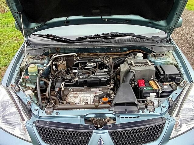 Синій Міцубісі Lancer, об'ємом двигуна 1.6 л та пробігом 167 тис. км за 4700 $, фото 9 на Automoto.ua