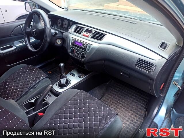 Синій Міцубісі Lancer, об'ємом двигуна 1.6 л та пробігом 168 тис. км за 5500 $, фото 3 на Automoto.ua