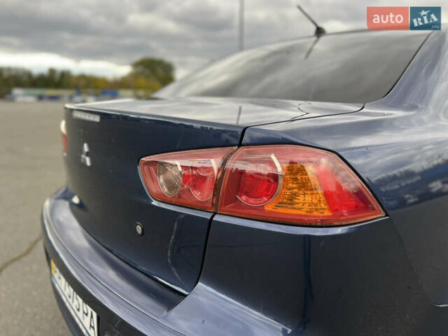 Мицубиси Лансер 2008 в Киеве на Automoto.ua Синий Мицубиси Лансер, объемом двигателя 2 л и пробегом 265 тыс. км за 6200 $, фото 6 на Automoto.ua