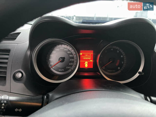 Синий Мицубиси Лансер, объемом двигателя 2 л и пробегом 120 тыс. км за 6100 $, фото 11 на Automoto.ua