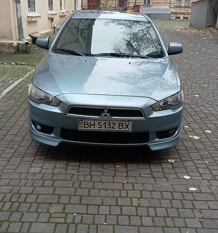 Синий Мицубиси Лансер, объемом двигателя 2 л и пробегом 300 тыс. км за 6900 $, фото 4 на Automoto.ua