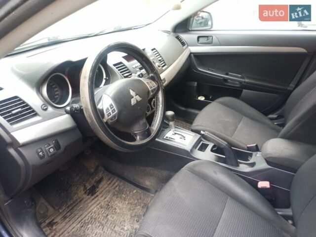 Синій Міцубісі Lancer, об'ємом двигуна 2 л та пробігом 265 тис. км за 5700 $, фото 6 на Automoto.ua