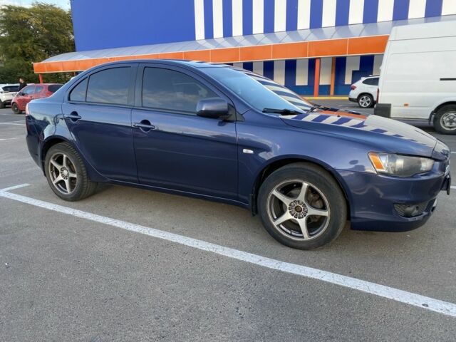 Синий Мицубиси Лансер, объемом двигателя 1.5 л и пробегом 247 тыс. км за 5000 $, фото 5 на Automoto.ua