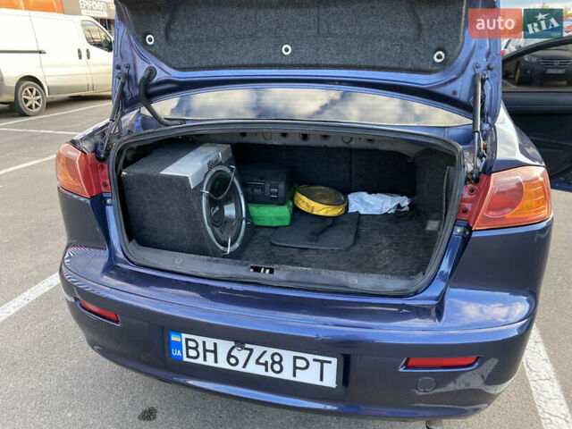 Синий Мицубиси Лансер, объемом двигателя 1.5 л и пробегом 247 тыс. км за 4500 $, фото 4 на Automoto.ua