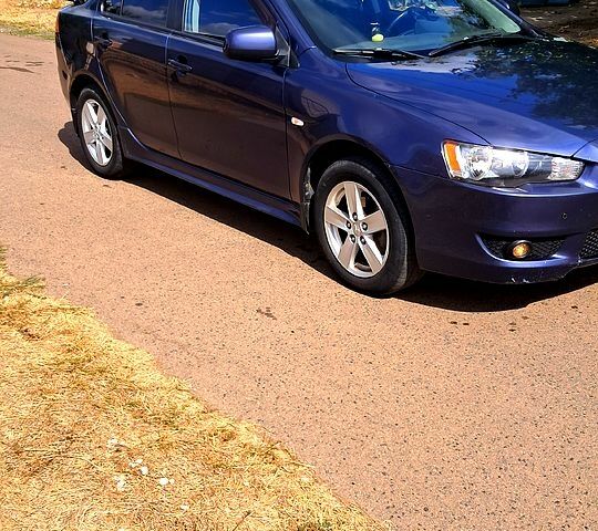 Синій Міцубісі Lancer, об'ємом двигуна 2 л та пробігом 242 тис. км за 5300 $, фото 1 на Automoto.ua