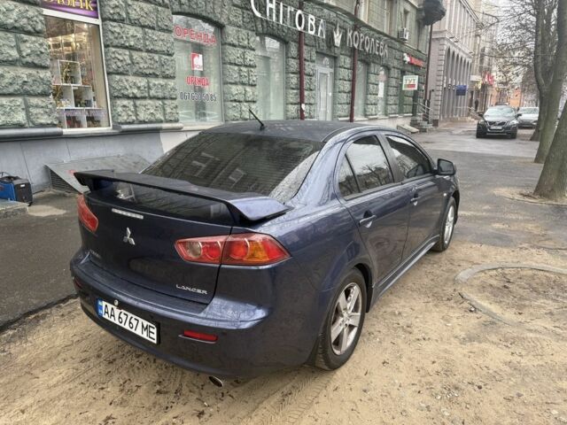 Синий Мицубиси Лансер, объемом двигателя 2 л и пробегом 200 тыс. км за 6700 $, фото 7 на Automoto.ua