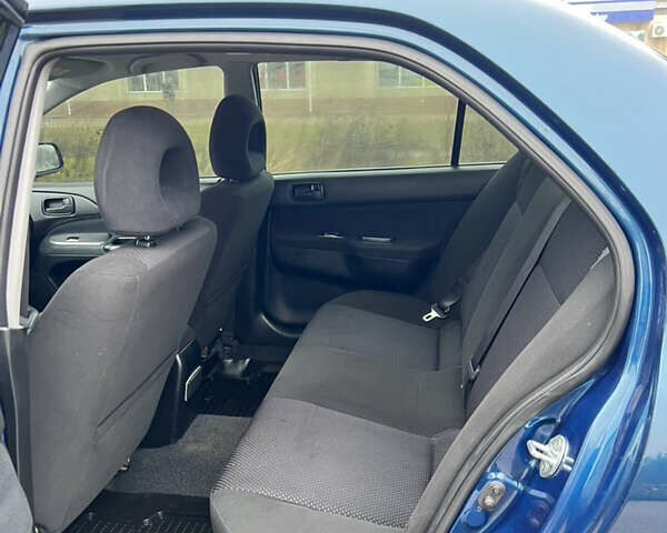 Синий Мицубиси Лансер, объемом двигателя 1.59 л и пробегом 126 тыс. км за 5950 $, фото 12 на Automoto.ua