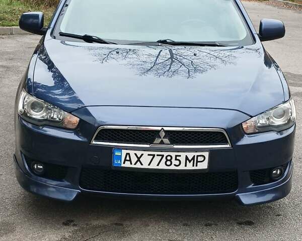 Синий Мицубиси Лансер, объемом двигателя 1.5 л и пробегом 220 тыс. км за 6999 $, фото 2 на Automoto.ua