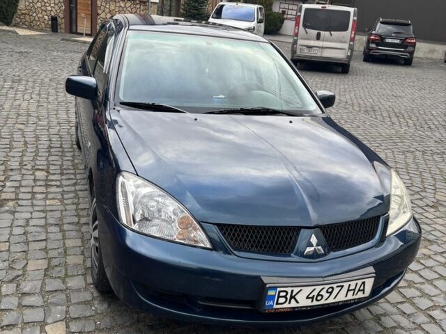 Міцубісі Lancer 2008 у Рівному на Automoto.ua Синій Міцубісі Lancer, об'ємом двигуна 1.6 л та пробігом 158 тис. км за 3900 $, фото 1 на Automoto.ua